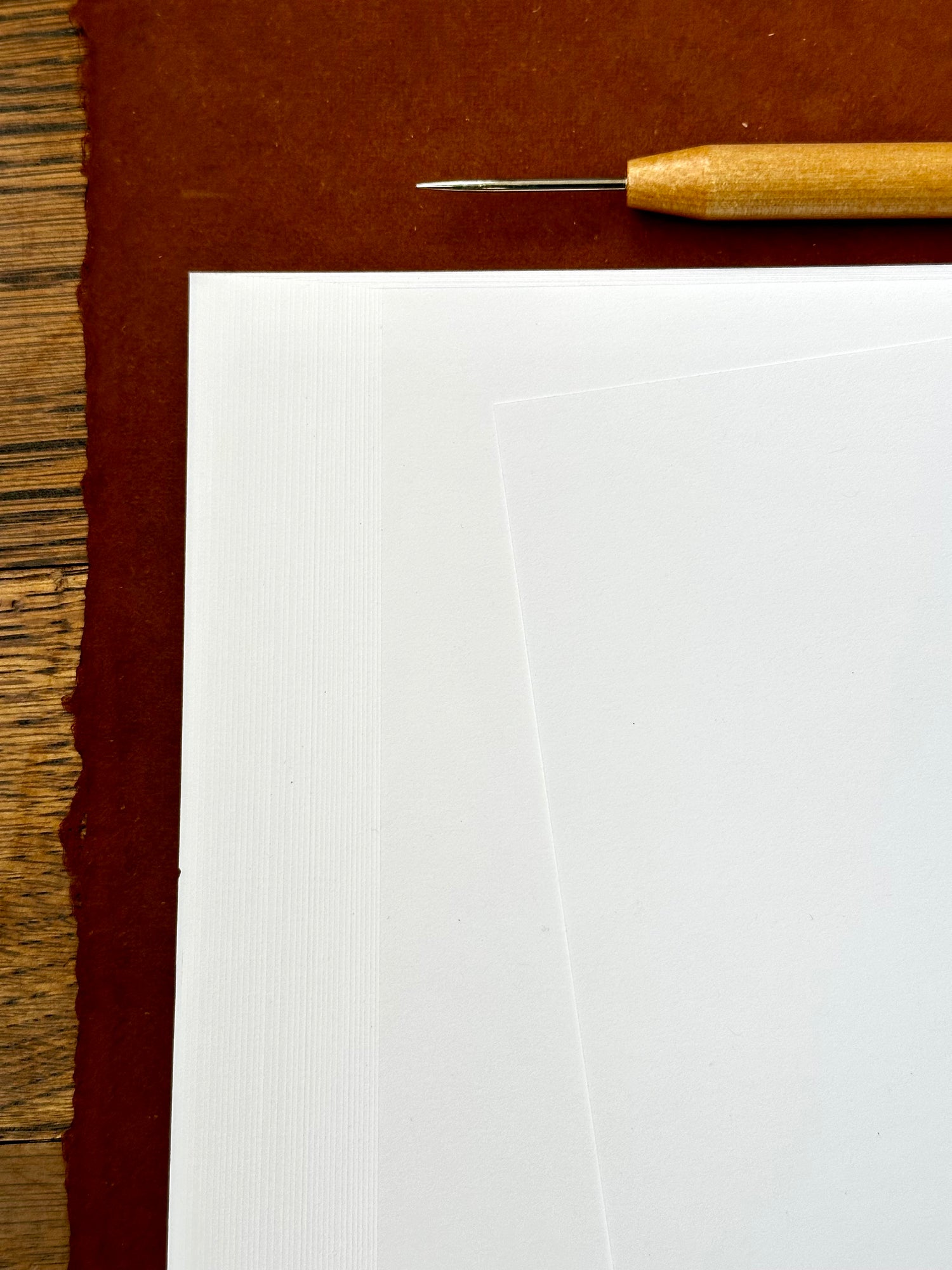 BLANK Short Grain Bookbinding Paper - 8.5" x 11"-  to enhance your book binding projects.  This smooth finish, white paper is 20% post consumer waste and acid free, ensuring high quality and eco-friendly book binding projects.